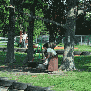 mother and child on swing set